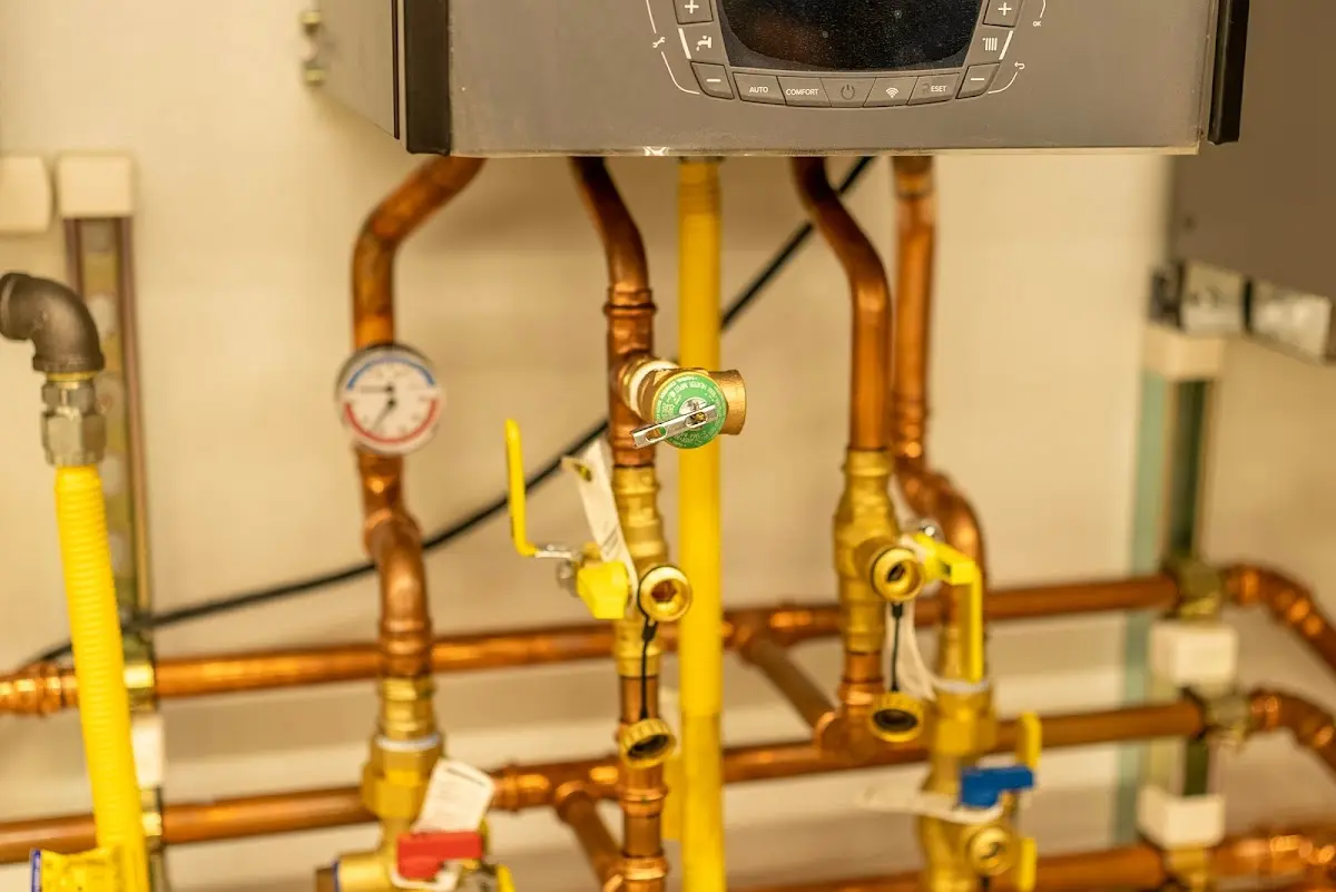 Licensed technician providing Water Heater Installation for a homeowner in Hopkinton